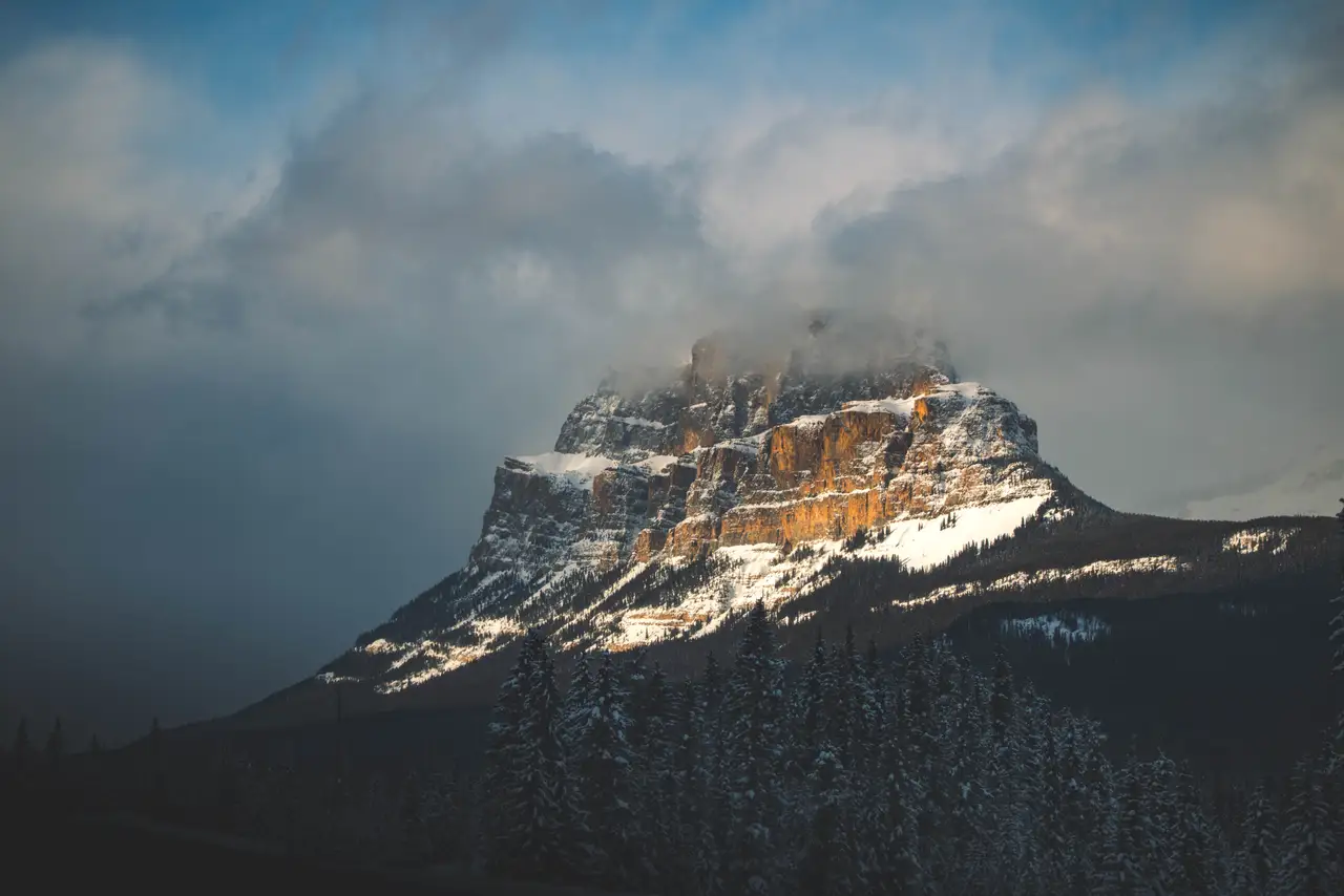 Fine-art photograph, “Snowy Mountain Beneath Storm Clouds - 5M2A8417.JPG,” from the British Columbia - Banff collection.