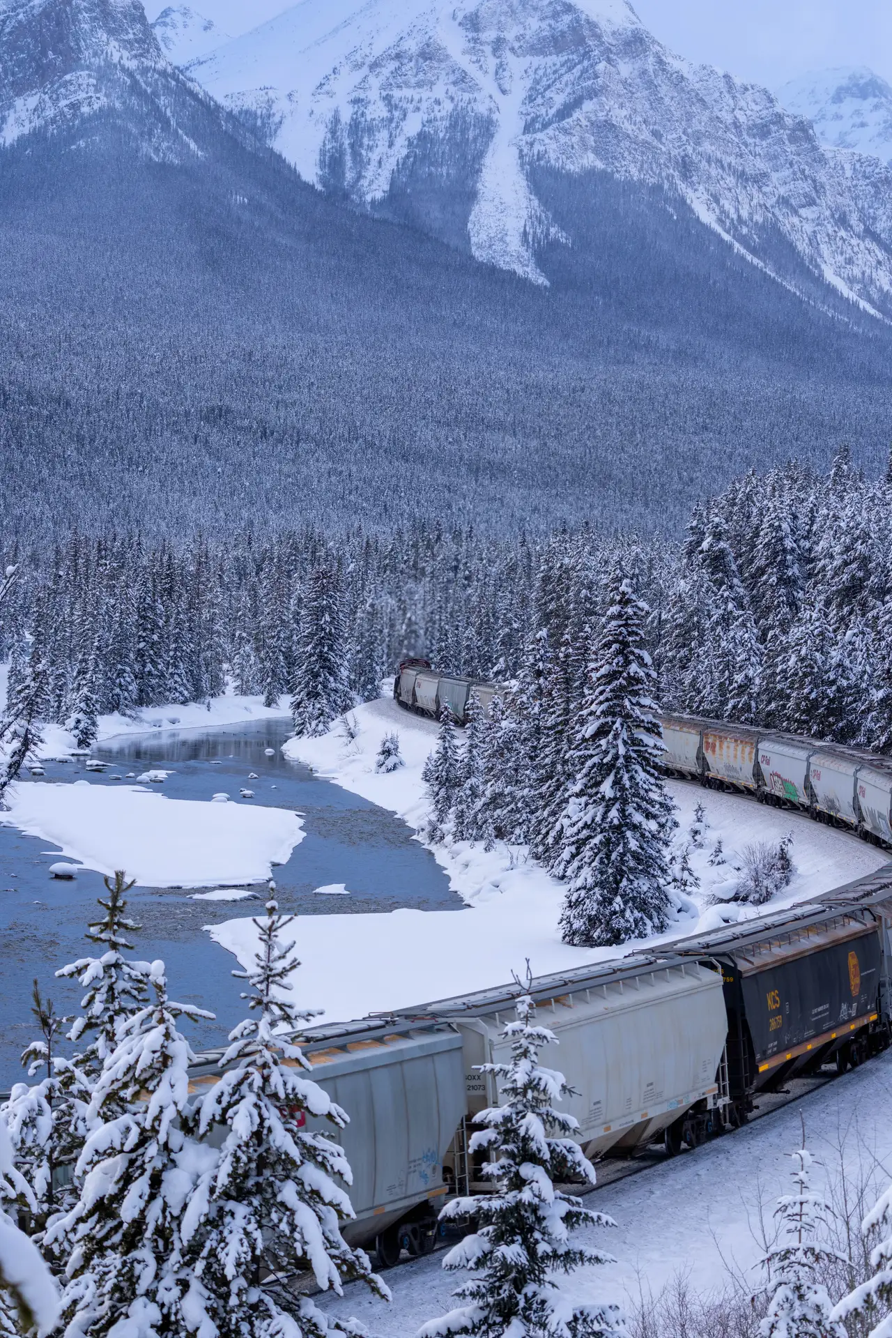 Fine-art photograph, “Banff Train and Snowy Mountains - 5M2A8622.JPG,” from the British Columbia - Banff collection.