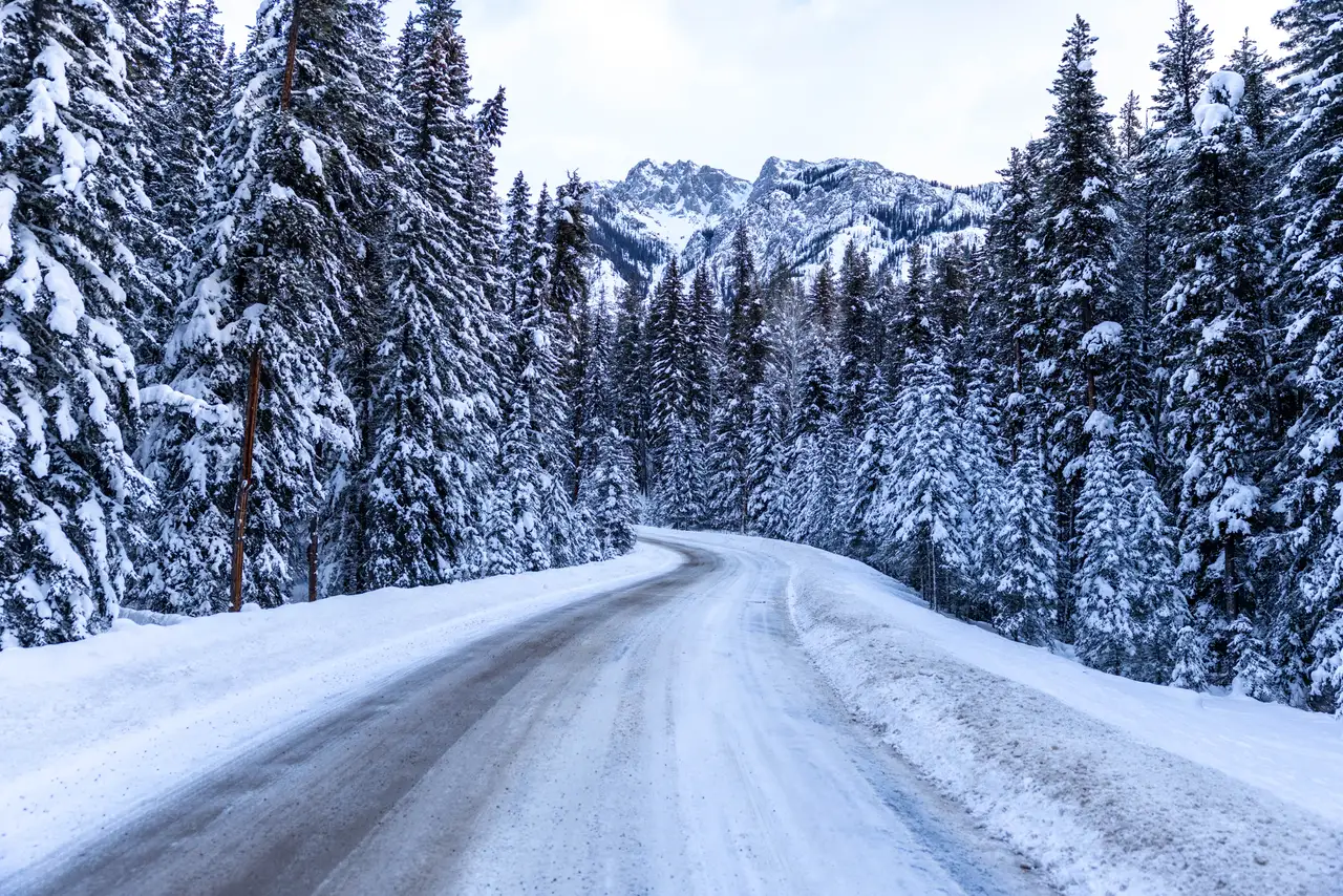 Fine-art photograph, “Snowy Banff Highway Curve - 5M2A8917.JPG,” from the British Columbia - Banff collection.