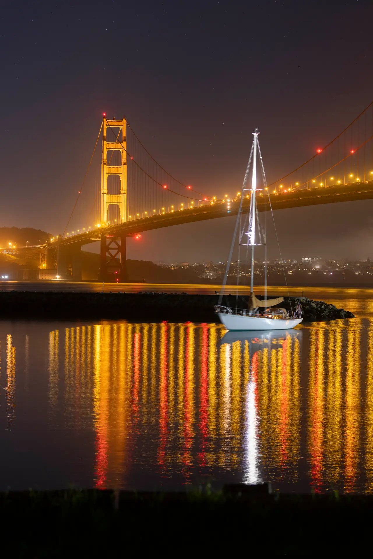 Fine-art photograph, “Golden Gate Bridge and Sailboat Reflections in Amber Light - _FIV9289.JPG,” from the California - SF - Golden Gate collection.