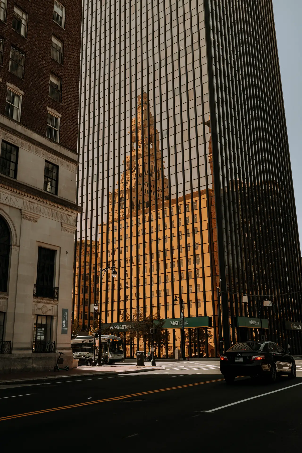 Fine-art photograph, “Hartford's Travelers Tower Reflected Along Main Street - 5M2A1052.JPG,” from the Connecticut collection.