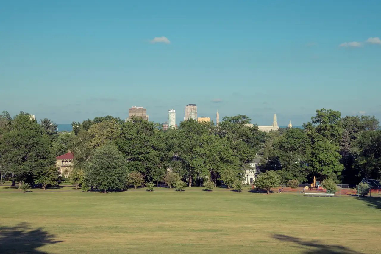 Fine-art photograph, “Hartford Skyline Beyond a Broad Park Lawn - RFIV1400.JPG,” from the Connecticut collection.