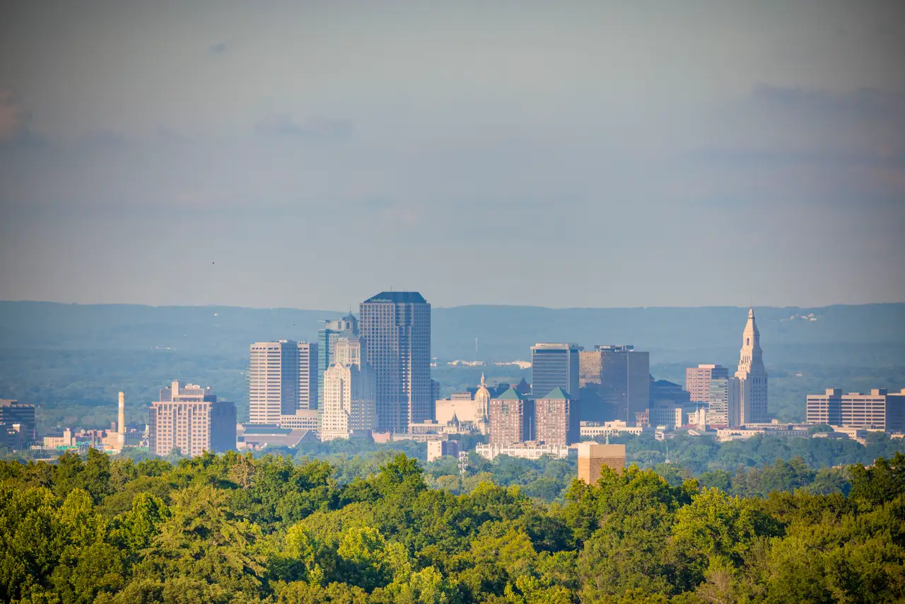 Fine-art photograph, “Hartford Skyline and Travelers Tower Above Summer Trees - RFIV1418.JPG,” from the Connecticut collection.