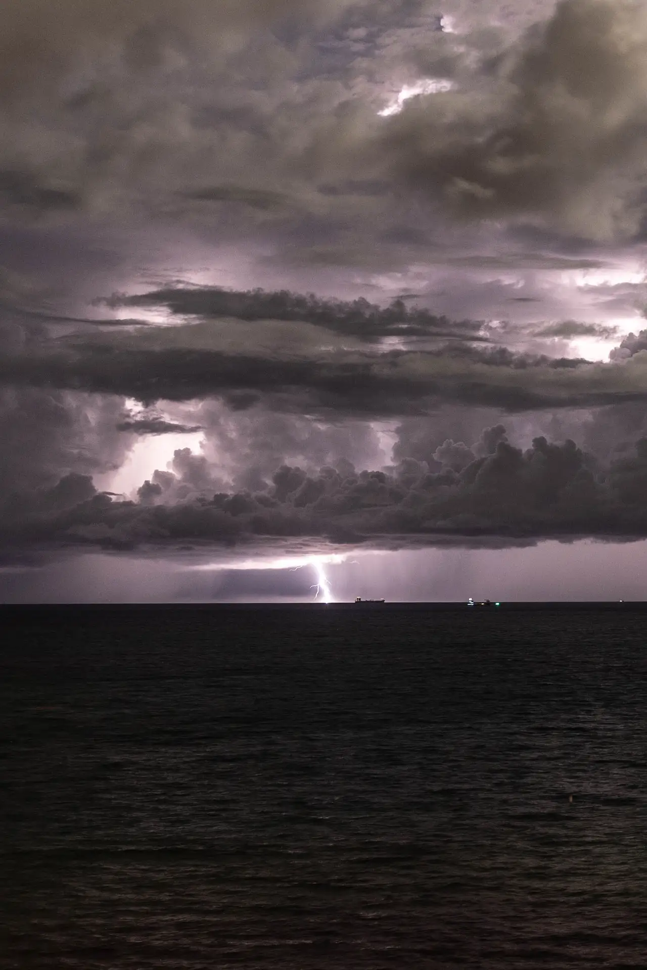 Fine-art photograph, “Miami Beach Lightning Storm, Distant Glow - _FIV7106.JPG,” from the Florida collection.