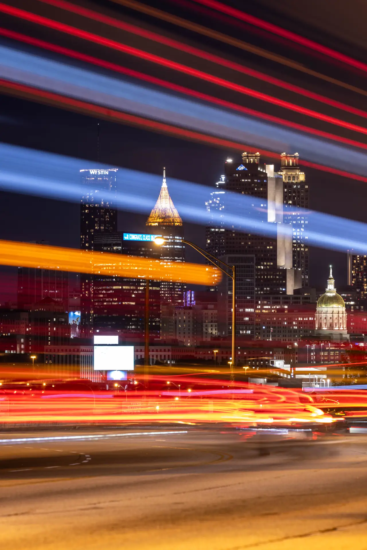 Fine-art photograph, “Atlanta Midtown Freeway Light Trails Behind a Fence - _FIV2162.JPG,” from the Georgia - ATL collection.