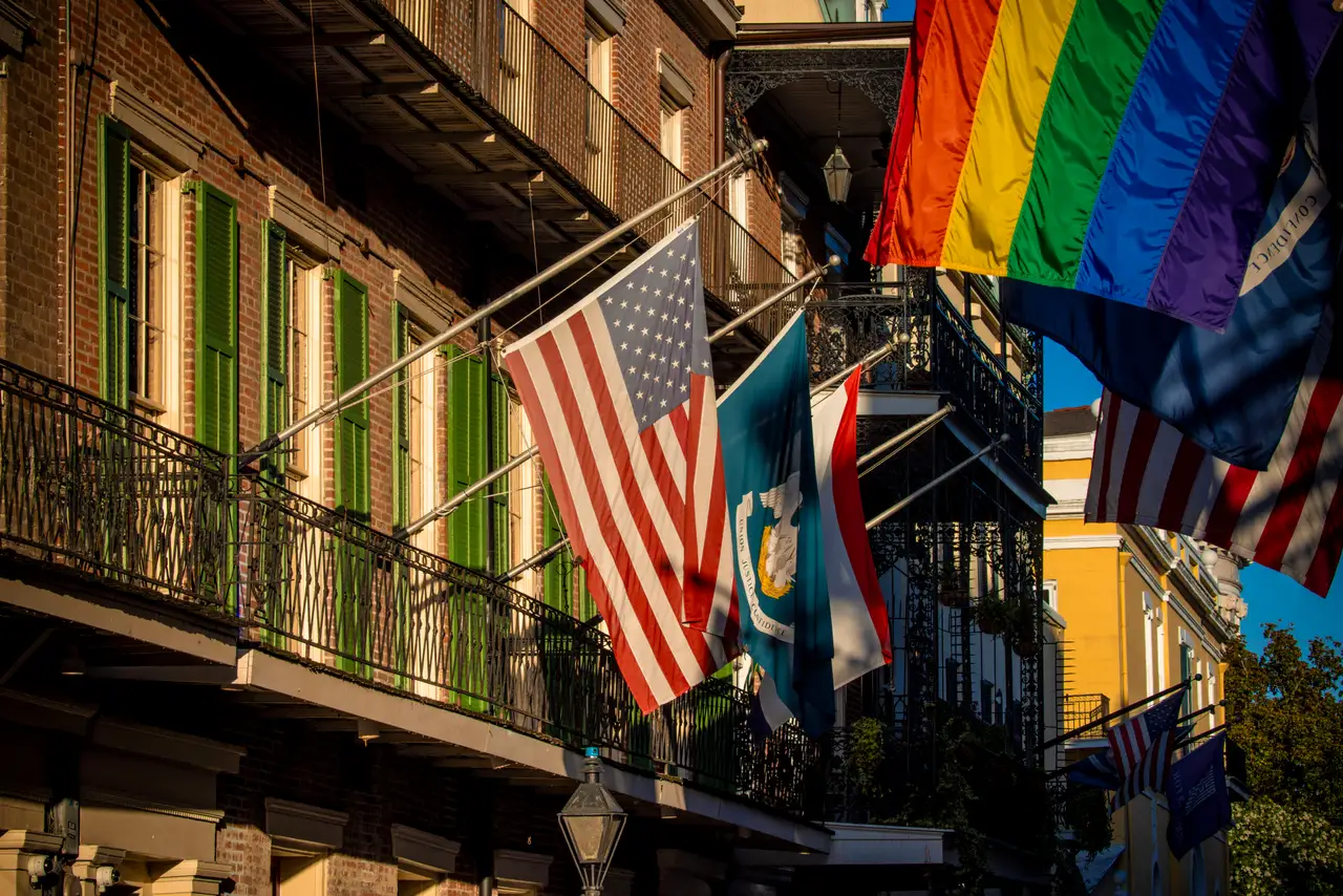 Fine-art photograph, “French Quarter Balcony with Pride Flags - _FIV1501.JPG,” from the Louisiana - New Orleans collection.