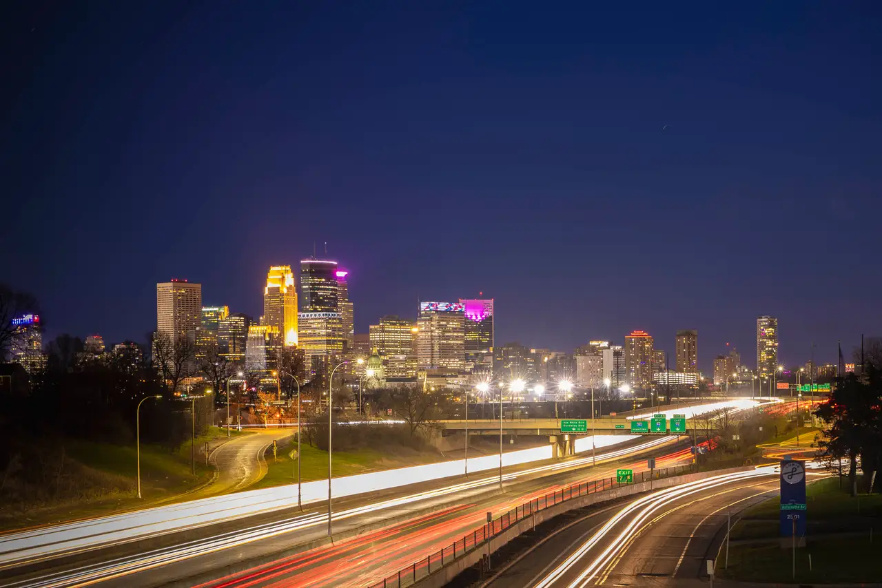 Fine-art photograph, “Minneapolis Skyline Light Trails, City in Motion - RFIV8456.JPG,” from the Minnesota collection.