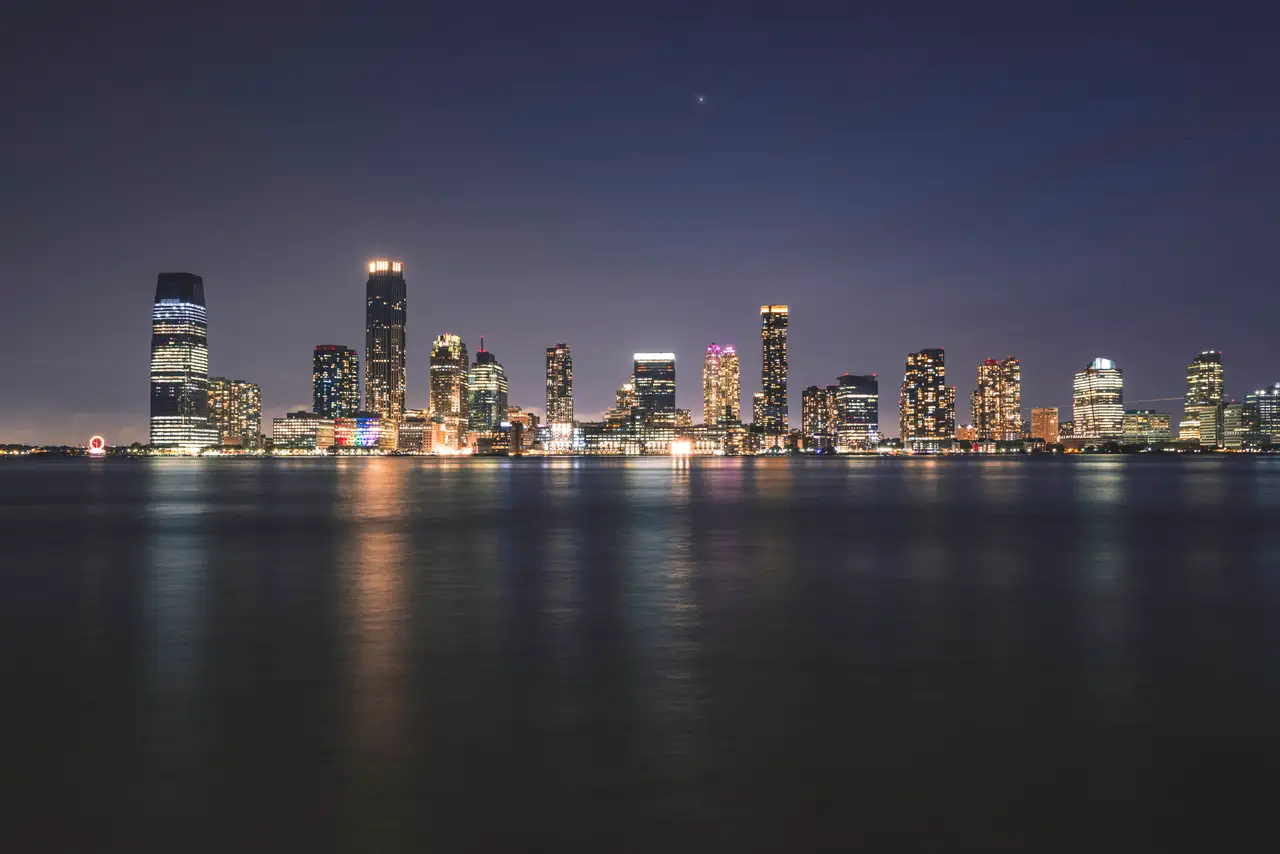 Fine-art photograph, “Jersey City Waterfront Skyline Beneath a Clear Night Sky - RFIV0521.JPG,” from the New Jersey collection.