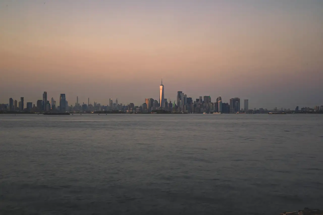 Fine-art photograph, “Lower Manhattan and One World Trade Center Across New York Harbor at Dusk - 5DM41140.JPG,” from the New York City collection.