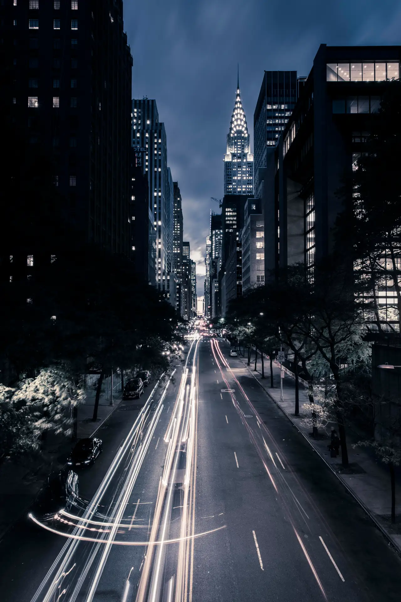 Fine-art photograph, “Manhattan Street Light Trails in Blue Hour - 5DM46831.JPG,” from the New York City collection.