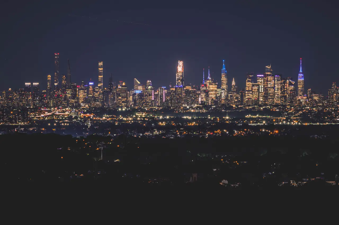 Fine-art photograph, “Midtown Manhattan Skyline and Empire State Building Across New Jersey at Night - _FIV8273.JPG,” from the New York City collection.