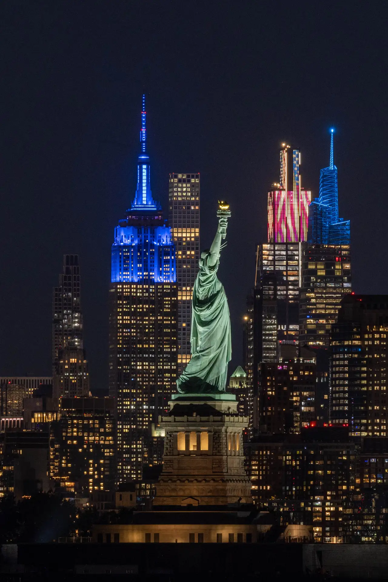 Fine-art photograph, “Statue of Liberty and Empire State in Patriotic Light, Steel and Water - _FIV8307.JPG,” from the New York City collection.