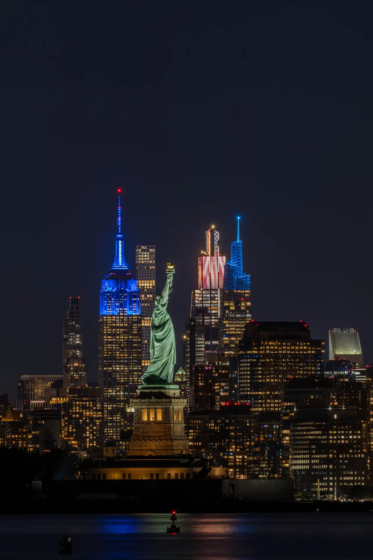 Fine-art photograph, “Statue of Liberty and Empire State at Night, Harbor Light - _FIV8323.JPG,” from the New York City collection.
