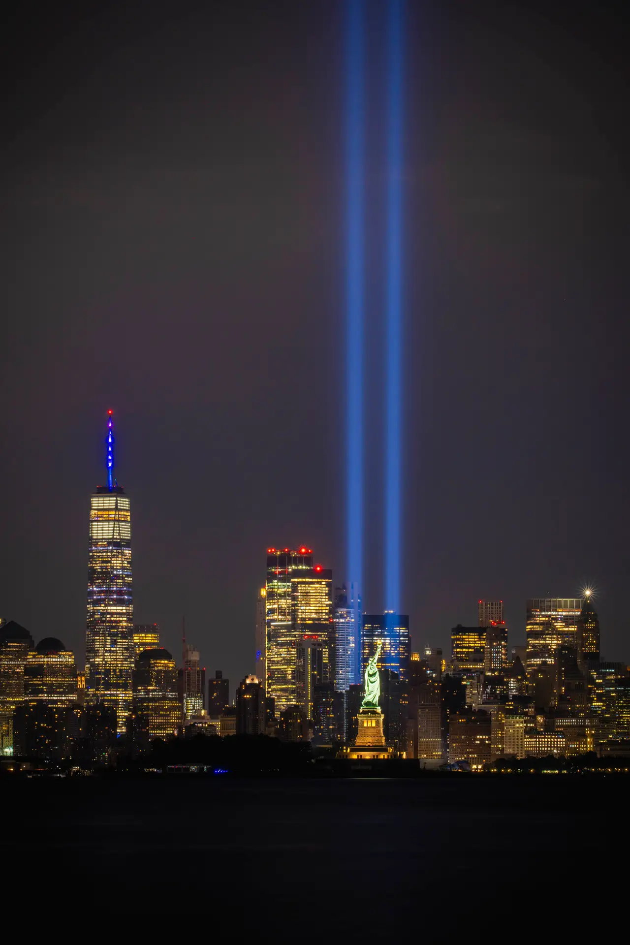 Fine-art photograph, “9/11 Tribute Lights and Lower Manhattan - 9.11RFIV3448.JPG,” from the New York City collection.
