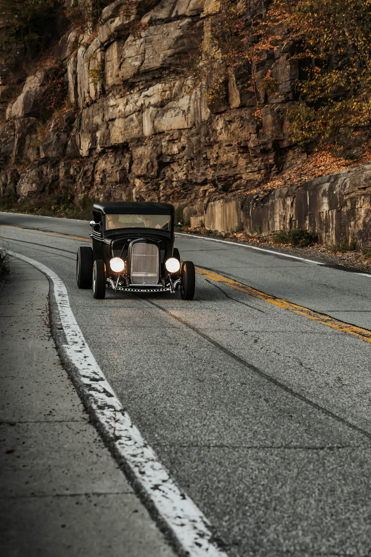 Fine-art photograph, “Adirondack Vintage Car on a Mountain Road - 5M2A1307.JPG,” from the New York State collection.