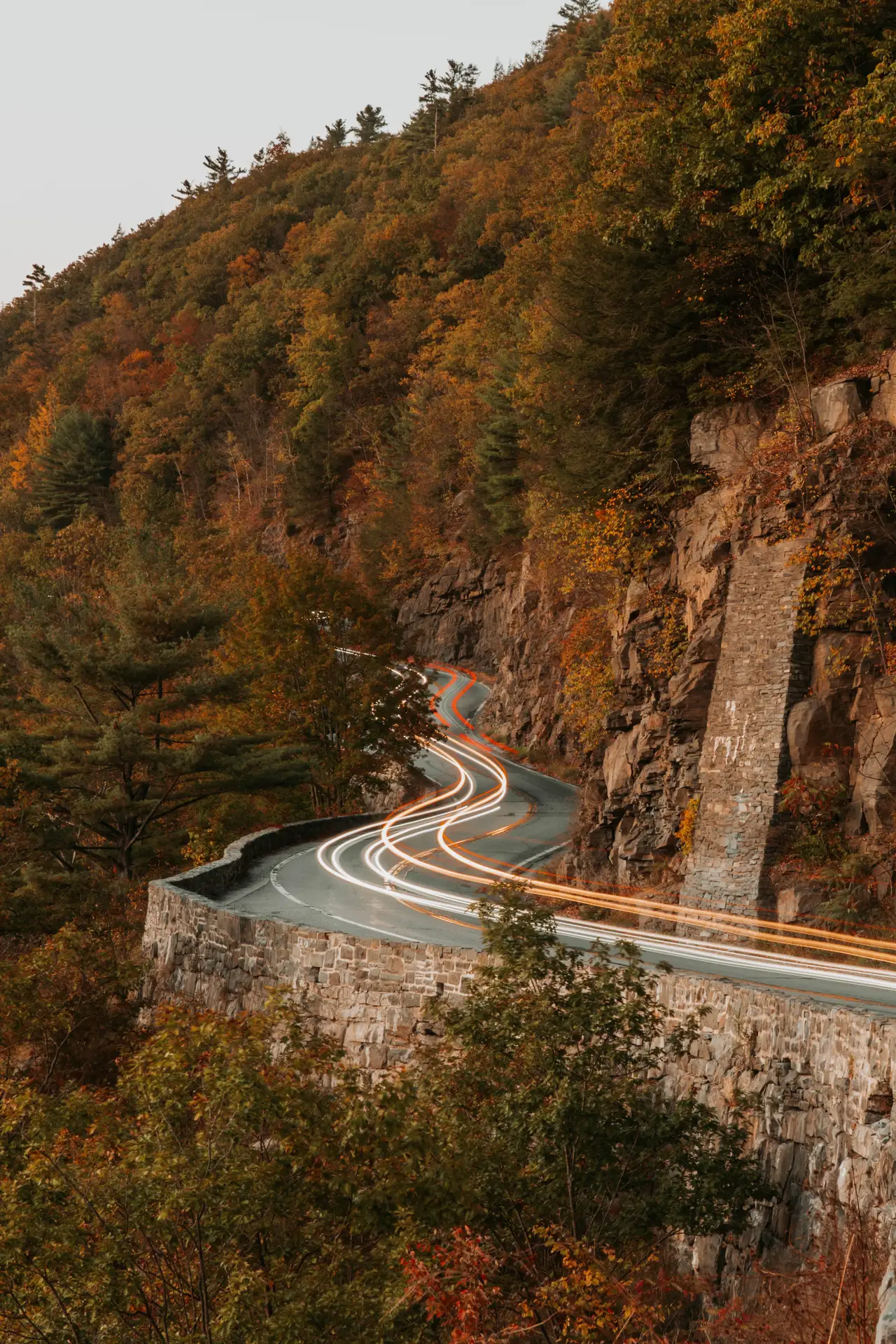 Fine-art photograph, “Adirondack Mountain Road Light Trails at Dusk - 5M2A1363.JPG,” from the New York State collection.