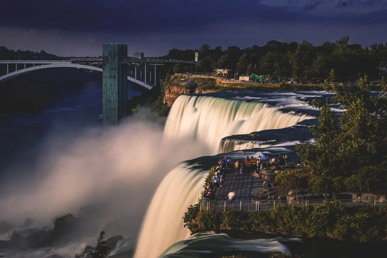 Fine-art photograph, “Niagara Falls and Rainbow Bridge at Dusk - _FIV5582.JPG,” from the New York State collection.