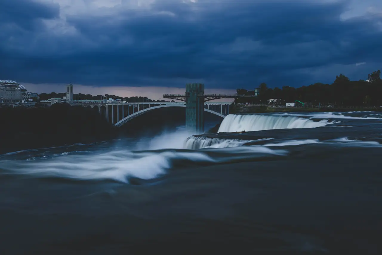 Fine-art photograph, “Niagara Falls Beneath Storm Clouds - _FIV5596.JPG,” from the New York State collection.