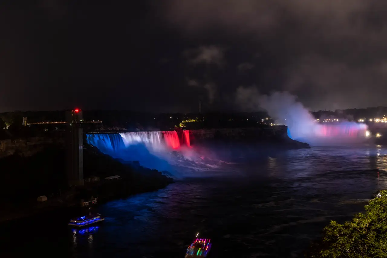 Fine-art photograph, “Niagara Falls Illuminated in Blue and Red - _FIV5733.JPG,” from the New York State collection.