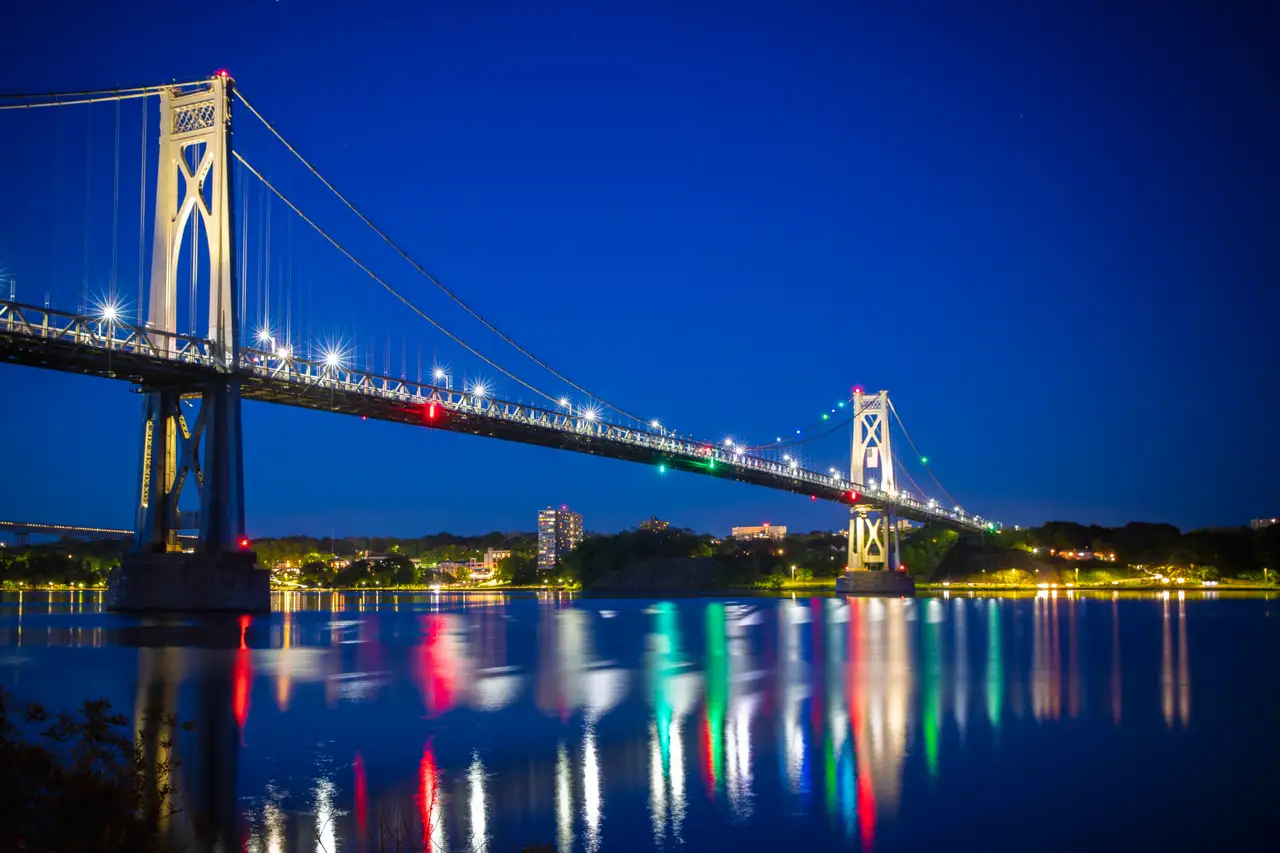 Fine-art photograph, “Poughkeepsie Mid-Hudson Bridge Reflections at Night - RFIV8802.JPG,” from the New York State collection.