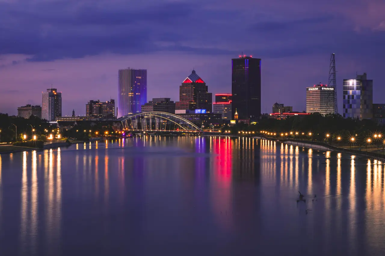 Fine-art photograph, “Rochester Skyline and Bridge Reflections at Dusk, Far Country - _FIV5194.JPG,” from the New York State collection.