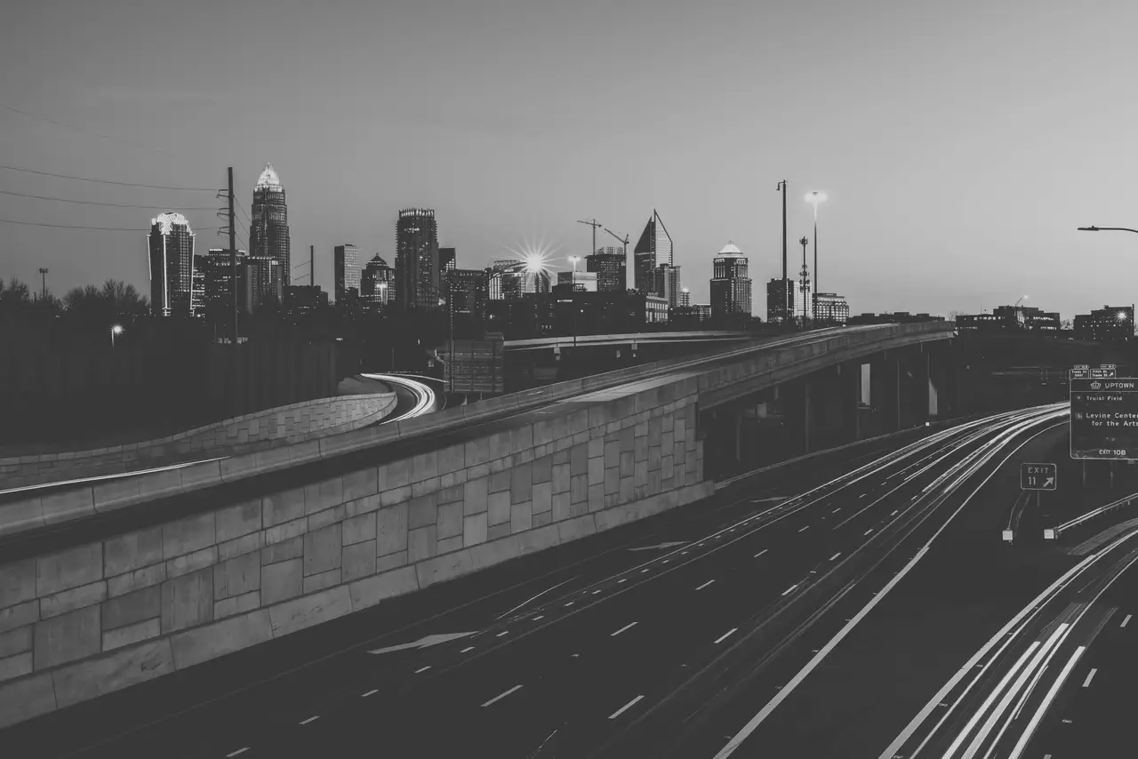 Fine-art photograph, “Charlotte Skyline and Freeway Light Trails in Black and White - RFIV4286.JPG,” from the North Carolina - Charlotte collection.