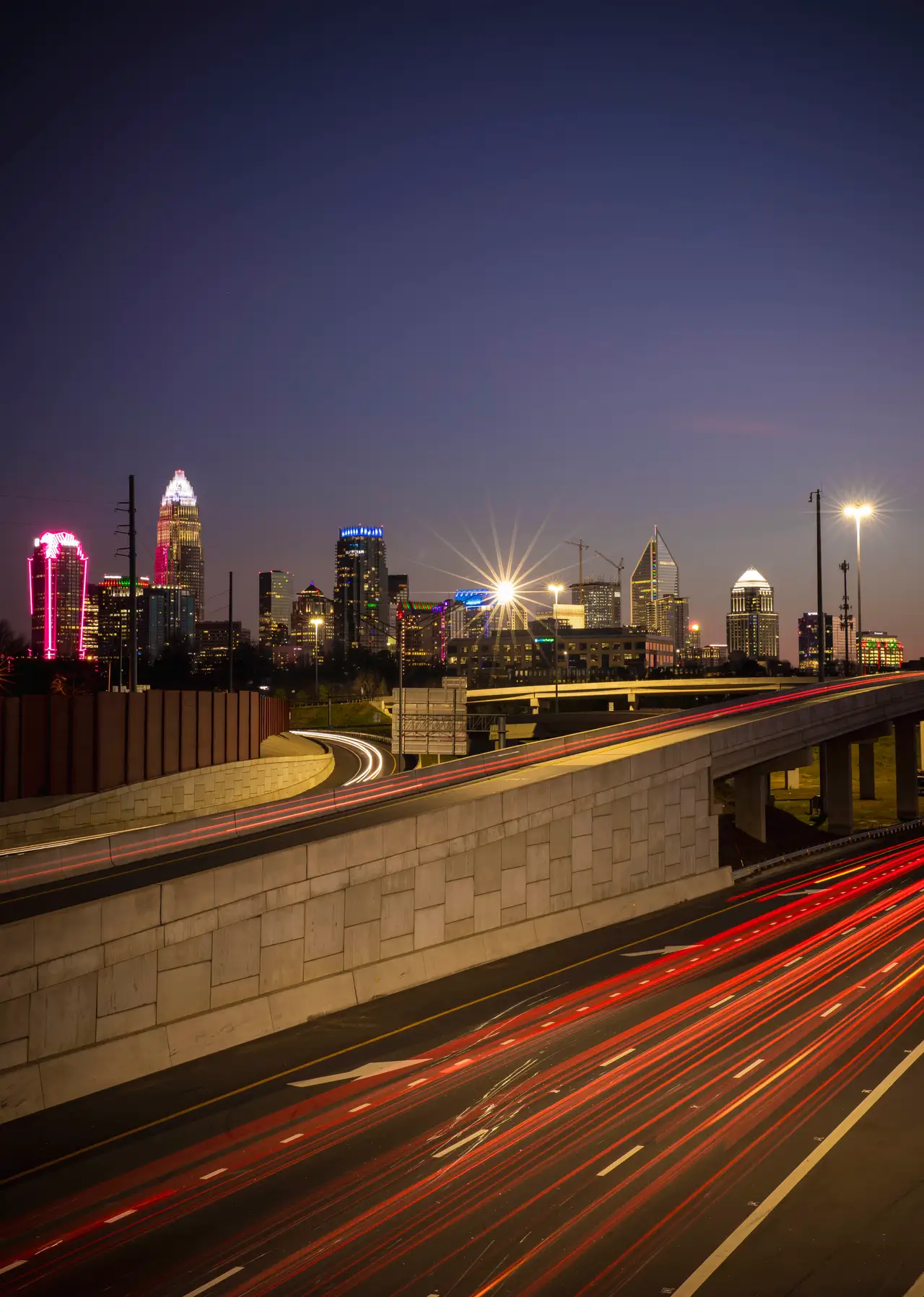 Fine-art photograph, “Charlotte Skyline and Freeway Light Trails at Blue Hour - RFIV4294.JPG,” from the North Carolina - Charlotte collection.
