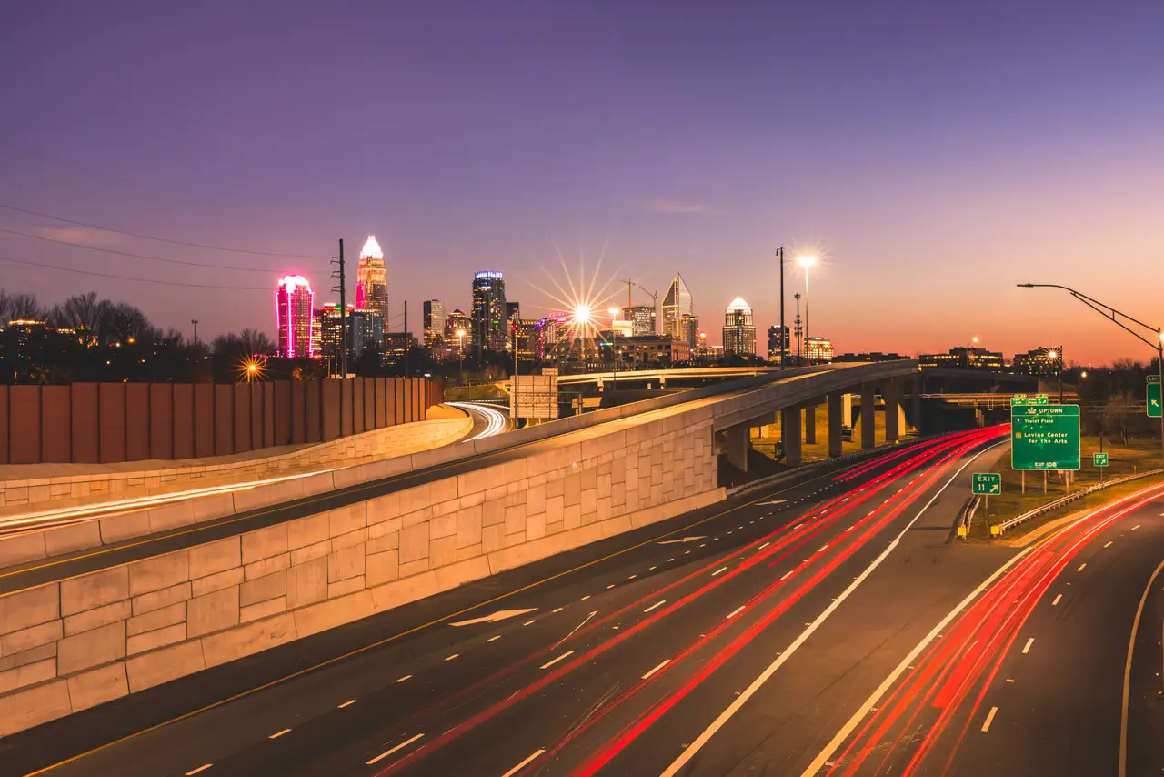 Fine-art photograph, “Charlotte Skyline and Freeway Light Trails at Dusk, Night Passage - RFIV4295.JPG,” from the North Carolina - Charlotte collection.