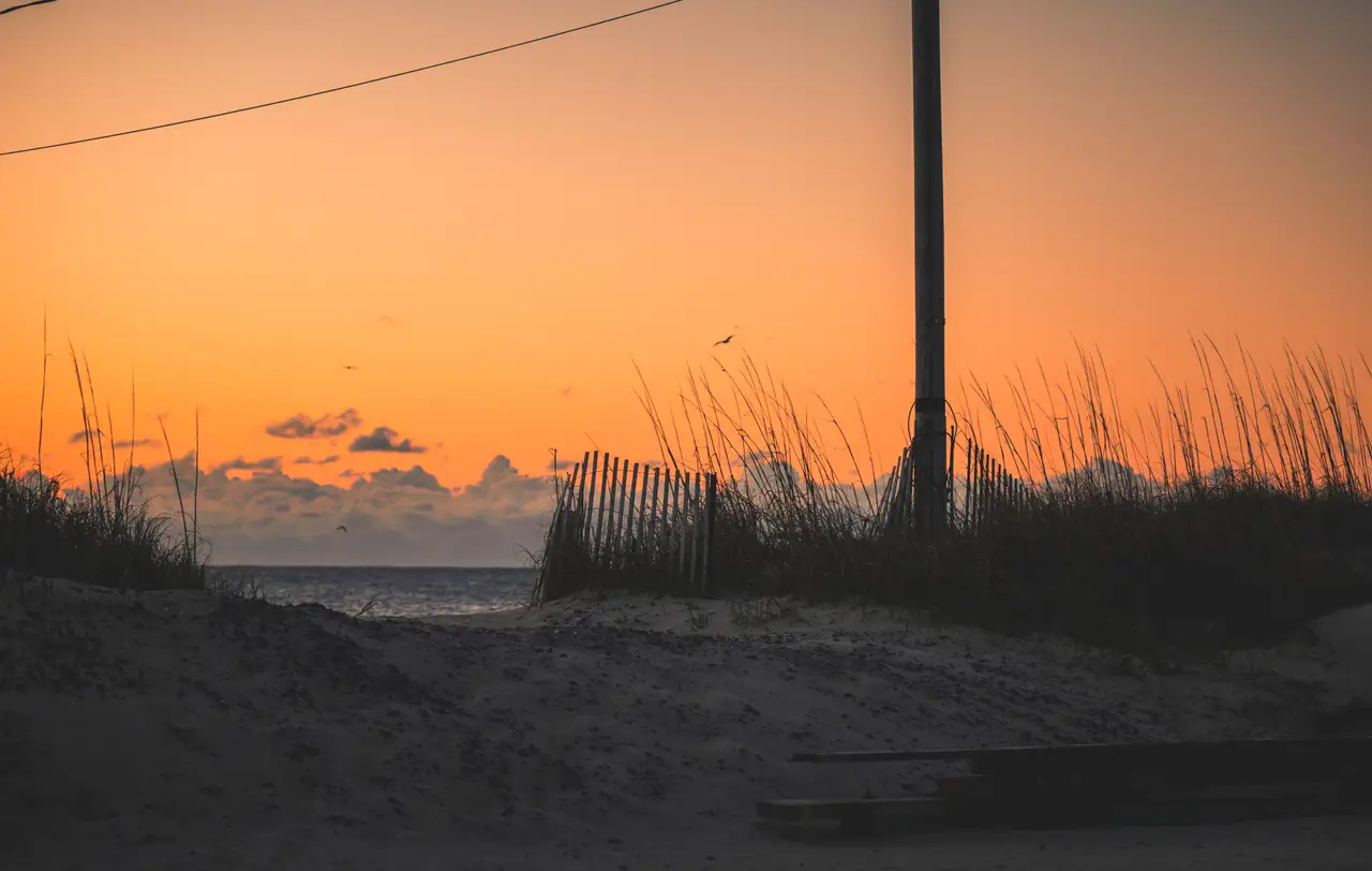 Fine-art photograph, “Outer Banks Sunrise, Last Warmth - RFIV6189.JPG,” from the North Carolina collection.