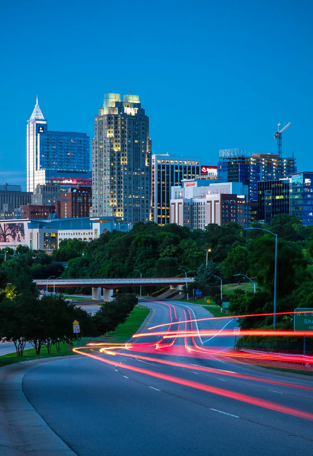 Fine-art photograph, “Raleigh Skyline Light Trails, Earth and Sky - 5DM44419.JPG,” from the North Carolina collection.
