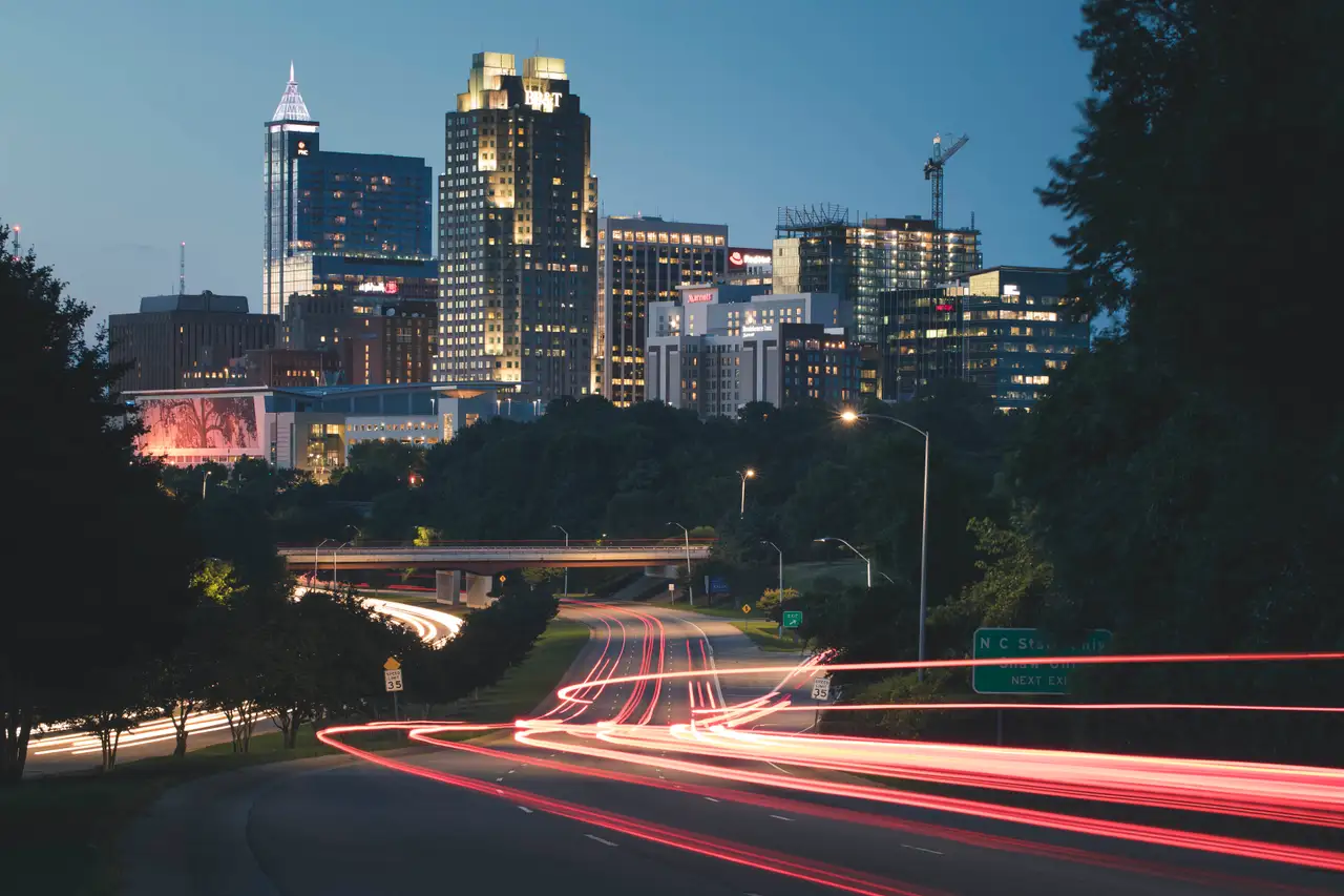 Fine-art photograph, “Raleigh Skyline Light Trails, Clear Break - 5DM44426.JPG,” from the North Carolina collection.