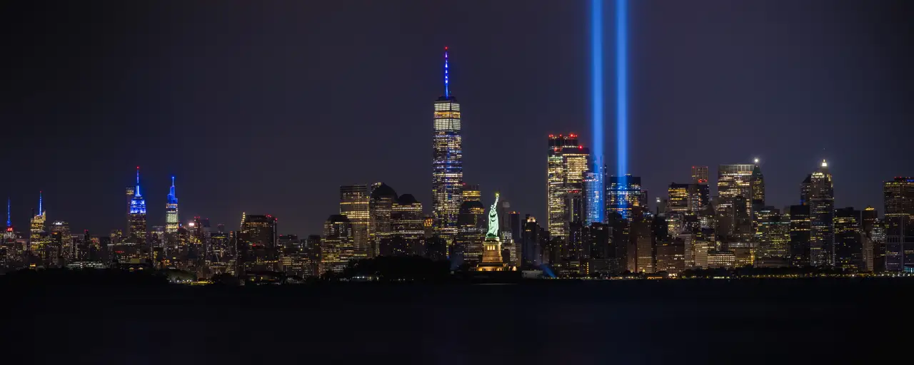 Fine-art photograph, “9/11 Tribute Lights and Lower Manhattan Panorama - New York City RFIV3438 Pano,” from the Panoramic collection.