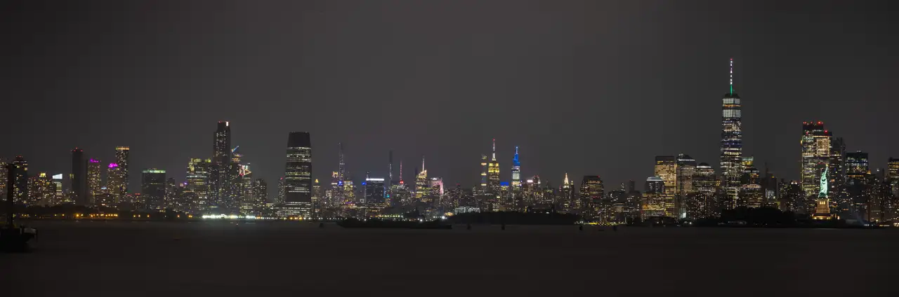 Fine-art photograph, “New York City Skyline Panorama, Between Storms - New York City RFIV4356 Pano,” from the Panoramic collection.