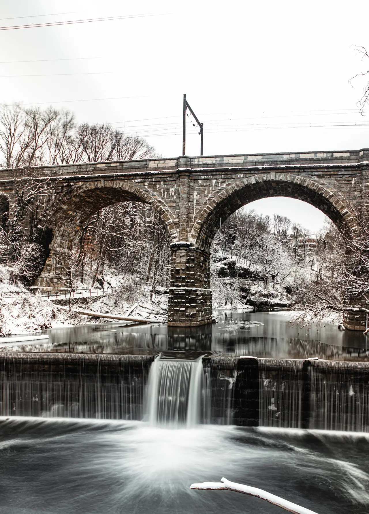 Fine-art photograph, “Stone Arch Bridge and Winter Waterfall, Last Train Home - RFIV5523,” from the Pennsylvania - Philly collection.