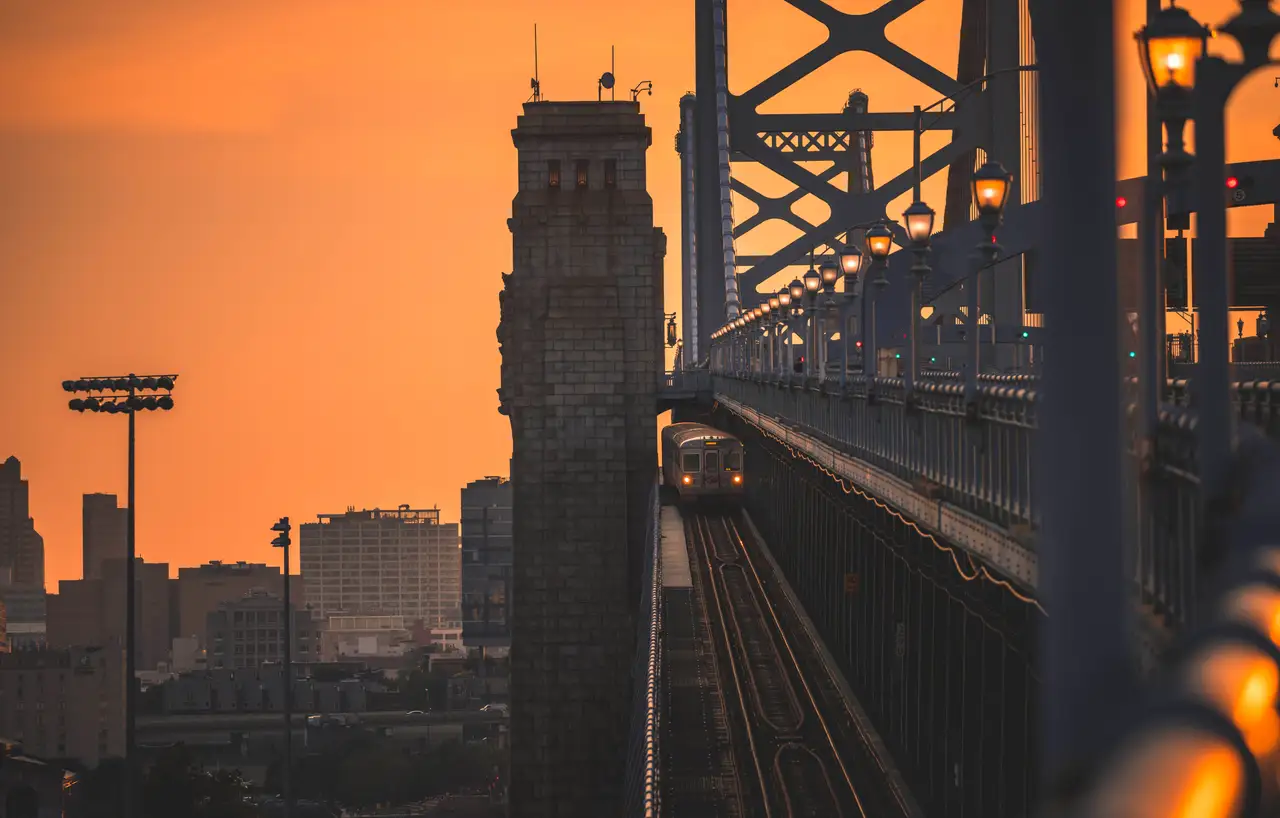 Fine-art photograph, “Benjamin Franklin Bridge Rail Line at Sunset - RFIV7404,” from the Pennsylvania - Philly collection.