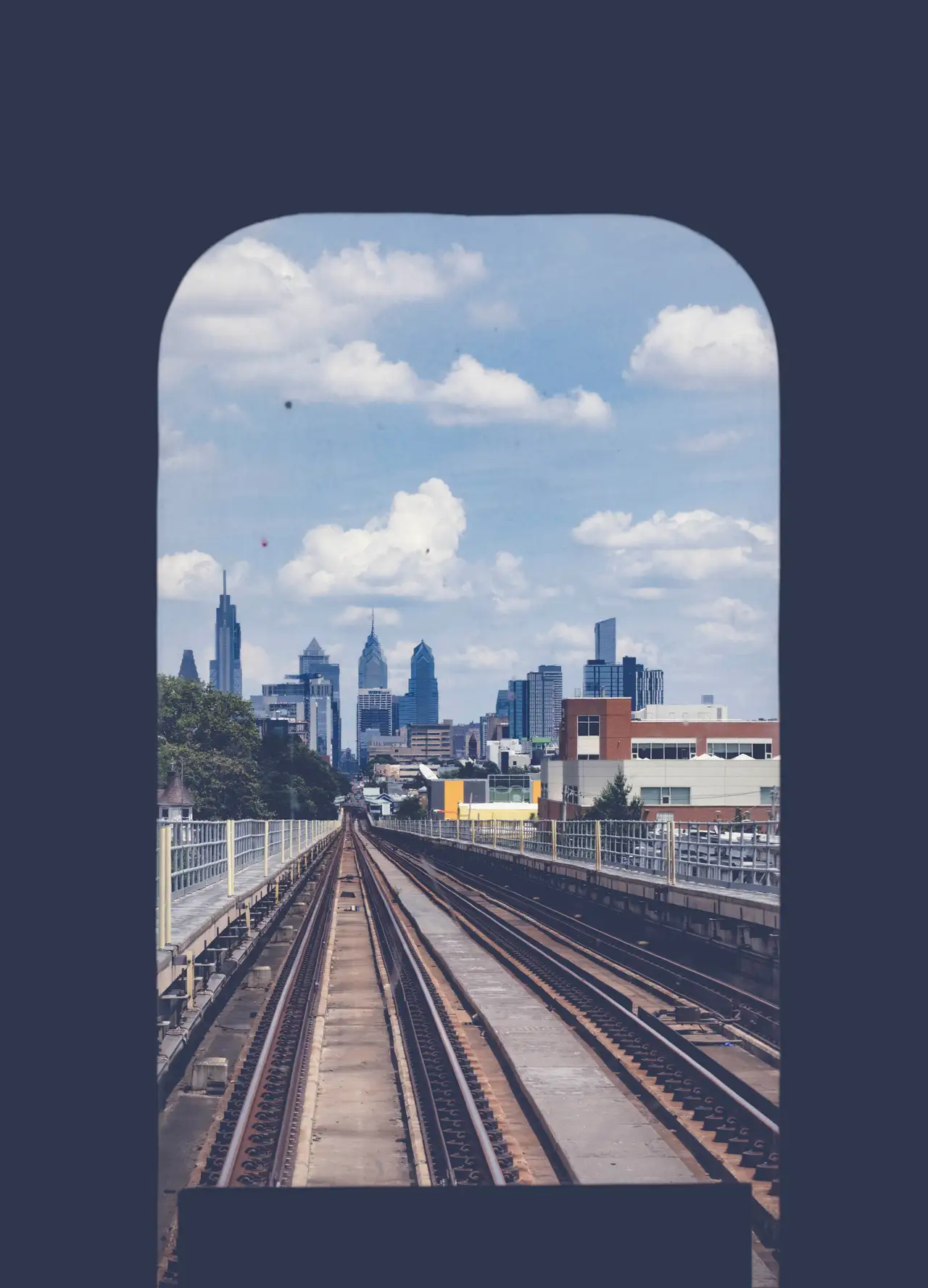 Fine-art photograph, “Philadelphia Skyline Through Elevated Rail Tracks, Windows at Dusk - RFIV8051,” from the Pennsylvania - Philly collection.