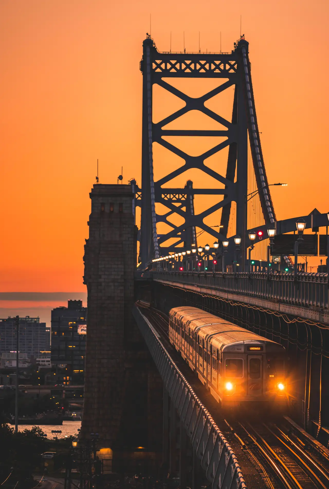 Fine-art photograph, “Ben Franklin Bridge Train at Sunset, Windows at Dusk - RFIV9293,” from the Pennsylvania - Philly collection.