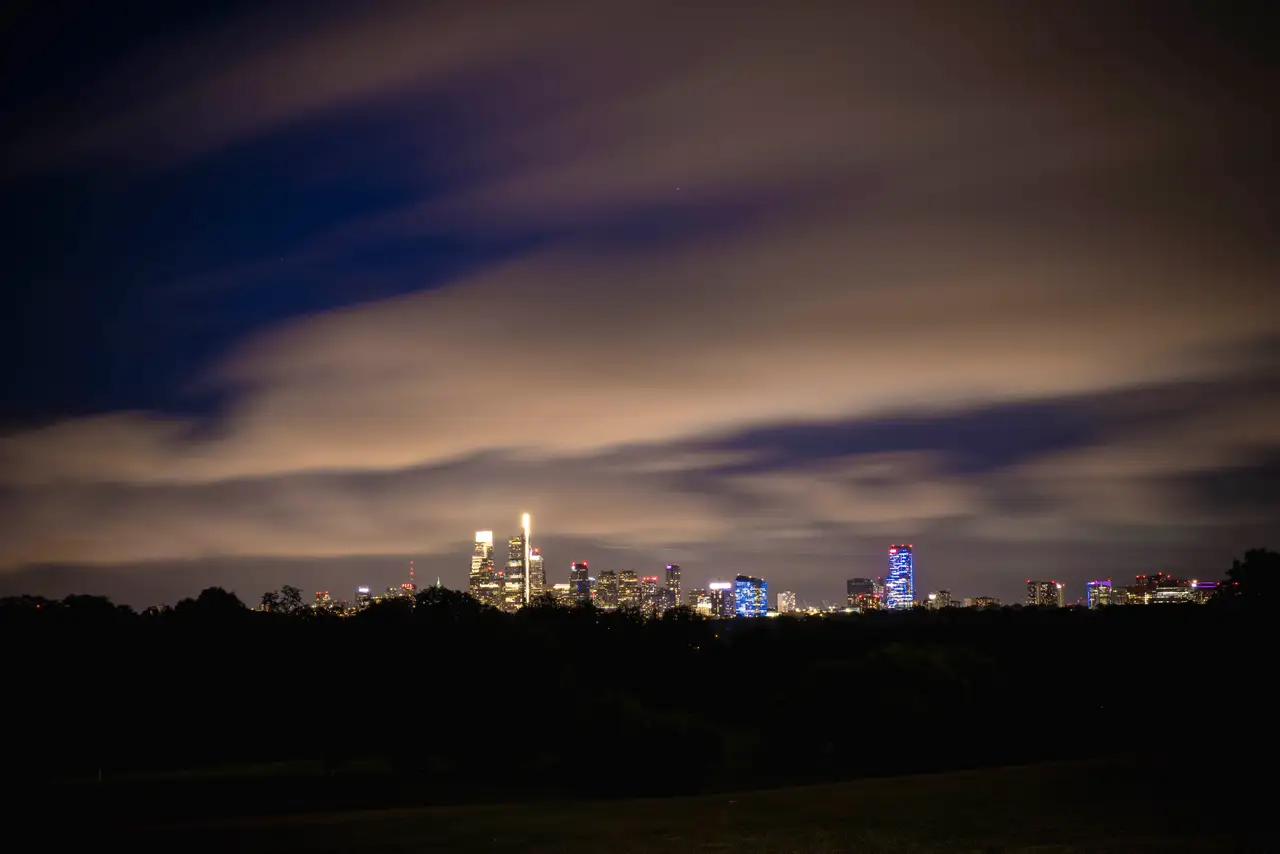 Fine-art photograph, “Philadelphia Skyline in Storm Clouds, Dawn Traffic - RFIV9759,” from the Pennsylvania - Philly collection.