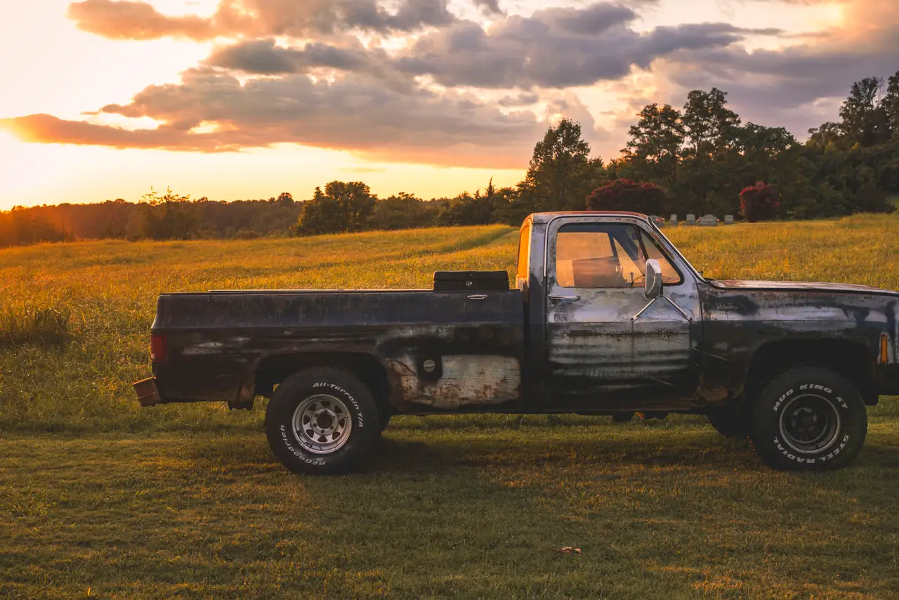Fine-art photograph, “Vintage Pickup in a Golden Field - FIV2295,” from the Virginia - non city collection.