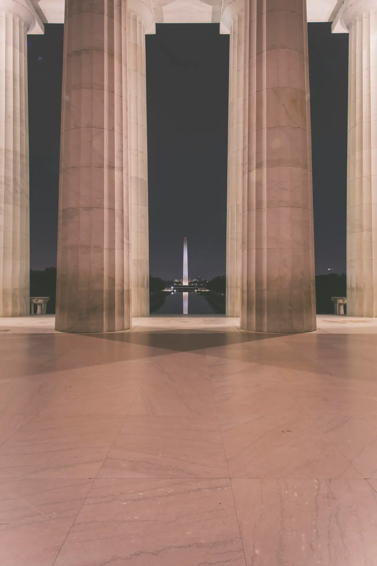 Fine-art photograph, “Washington Monument Framed by Columns - 5DM40307,” from the Washington D.C. collection.