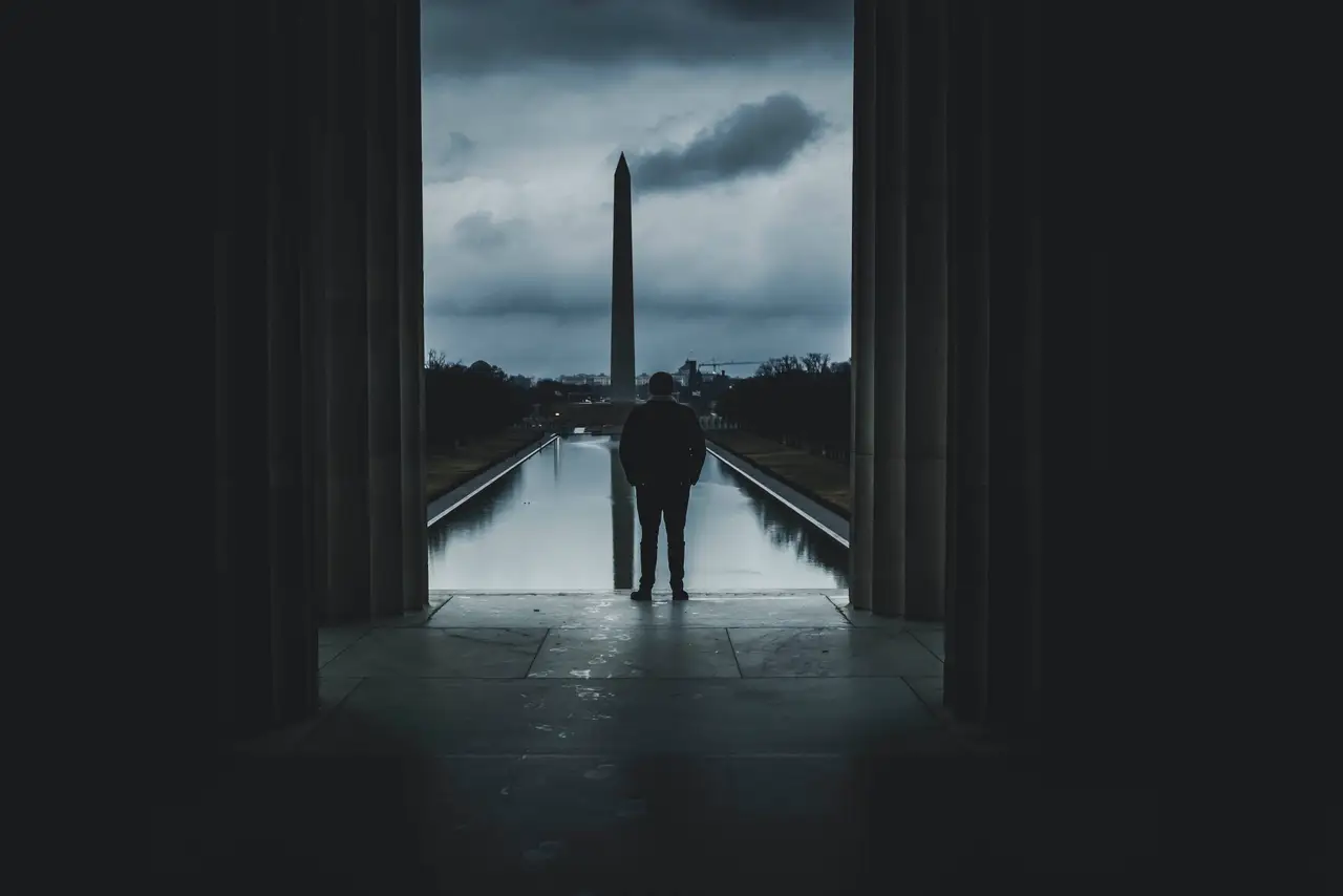 Fine-art photograph, “Washington Monument Through Lincoln Memorial Columns in Rain - RFIV2691,” from the Washington D.C. collection.