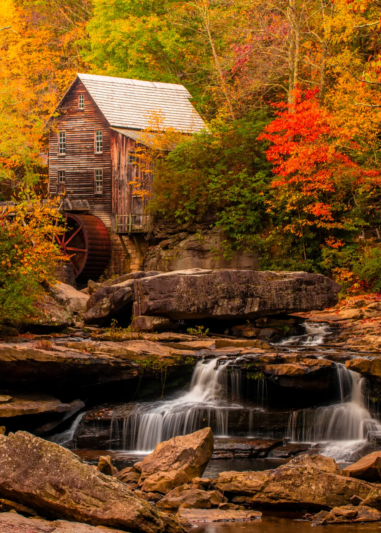 Fine-art photograph, “Glade Creek Grist Mill in Vertical Autumn, Earth and Sky - RFIV9628,” from the West Virginia collection.
