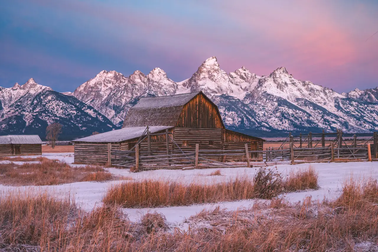 Fine-art photograph, “Moulton Barn and Tetons at Sunset, Quiet Distance - 5M2A4497,” from the Wyoming collection.